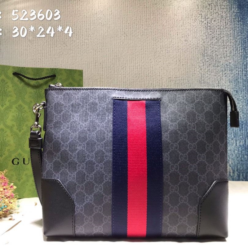 G*u*i clutch bags